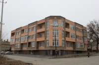 Дом на углу 26 Бакинских Комиссаров и Щорса